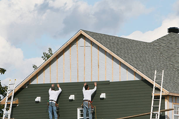 Professional Siding Repair technician working in Alger, OH